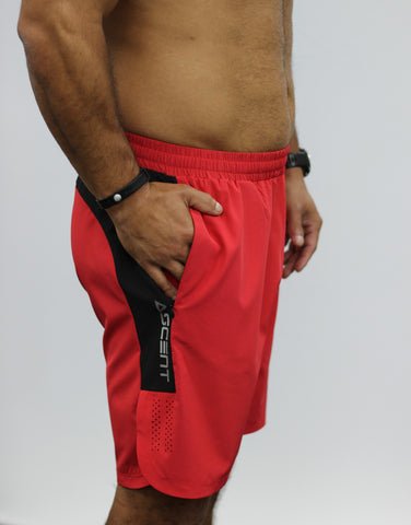Red men's gym shorts, with zip pockets.