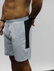 Light grey Men's gym shorts with zip pockets.