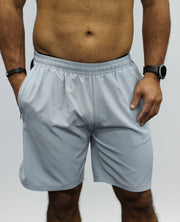 Light grey men's gym shorts, with zip pockets