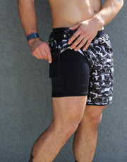 Men's workout shorts with compression liner and pockets